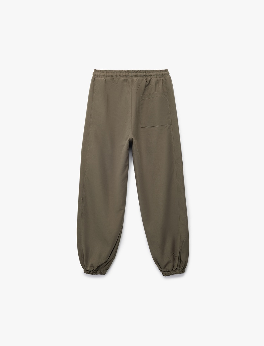  Erkek Çocuk Cepli Beli Lastikli Bağlamalı Loose Fit Jogger Paraşüt Pantolon