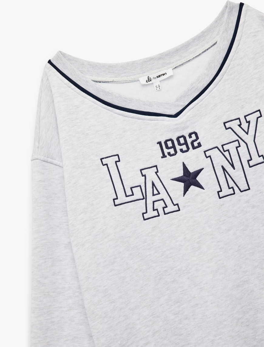   Uzun Kollu V Yaka Biyeli Nakışlı Oversize Sweatshirt