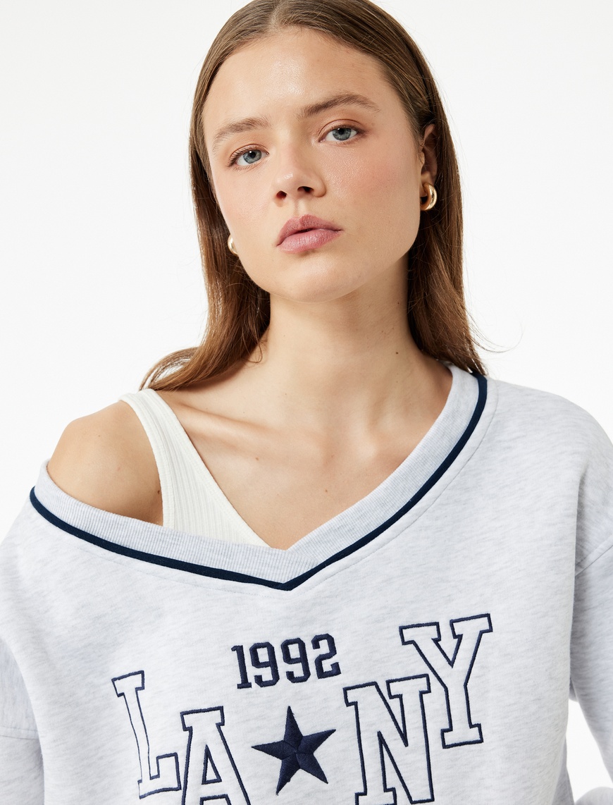   Uzun Kollu V Yaka Biyeli Nakışlı Oversize Sweatshirt