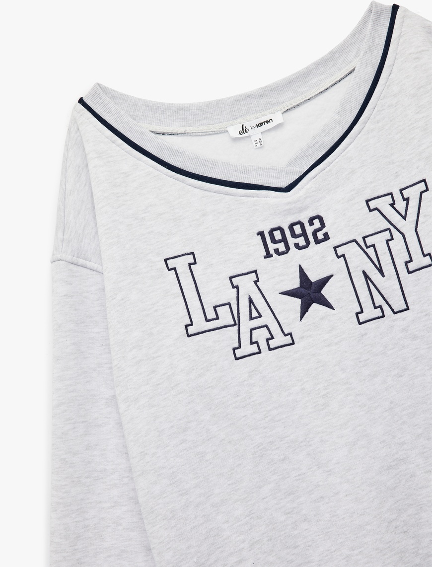   Uzun Kollu V Yaka Biyeli Nakışlı Oversize Sweatshirt