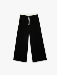 Beli Lastikli Cepli Geniş Paça Pantolon