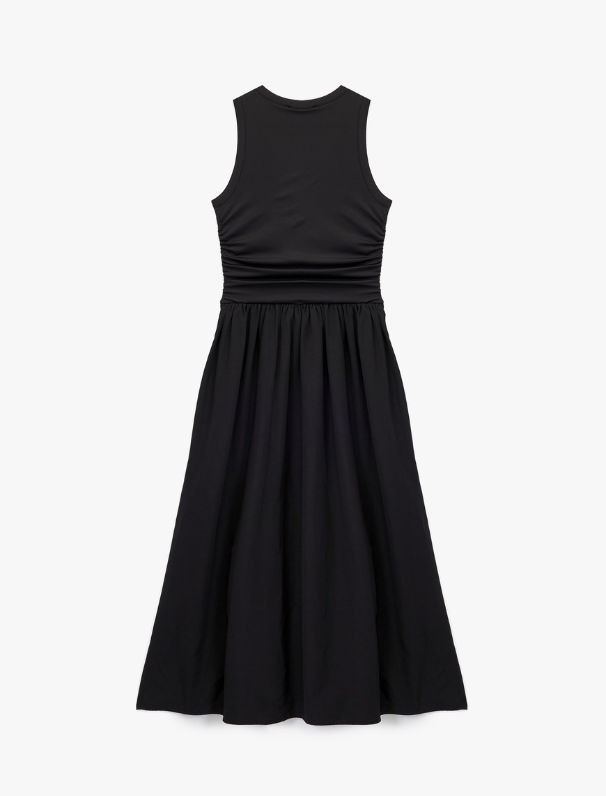   Slim Fit Bisiklet Yaka Kolsuz Midi Kloş Elbise