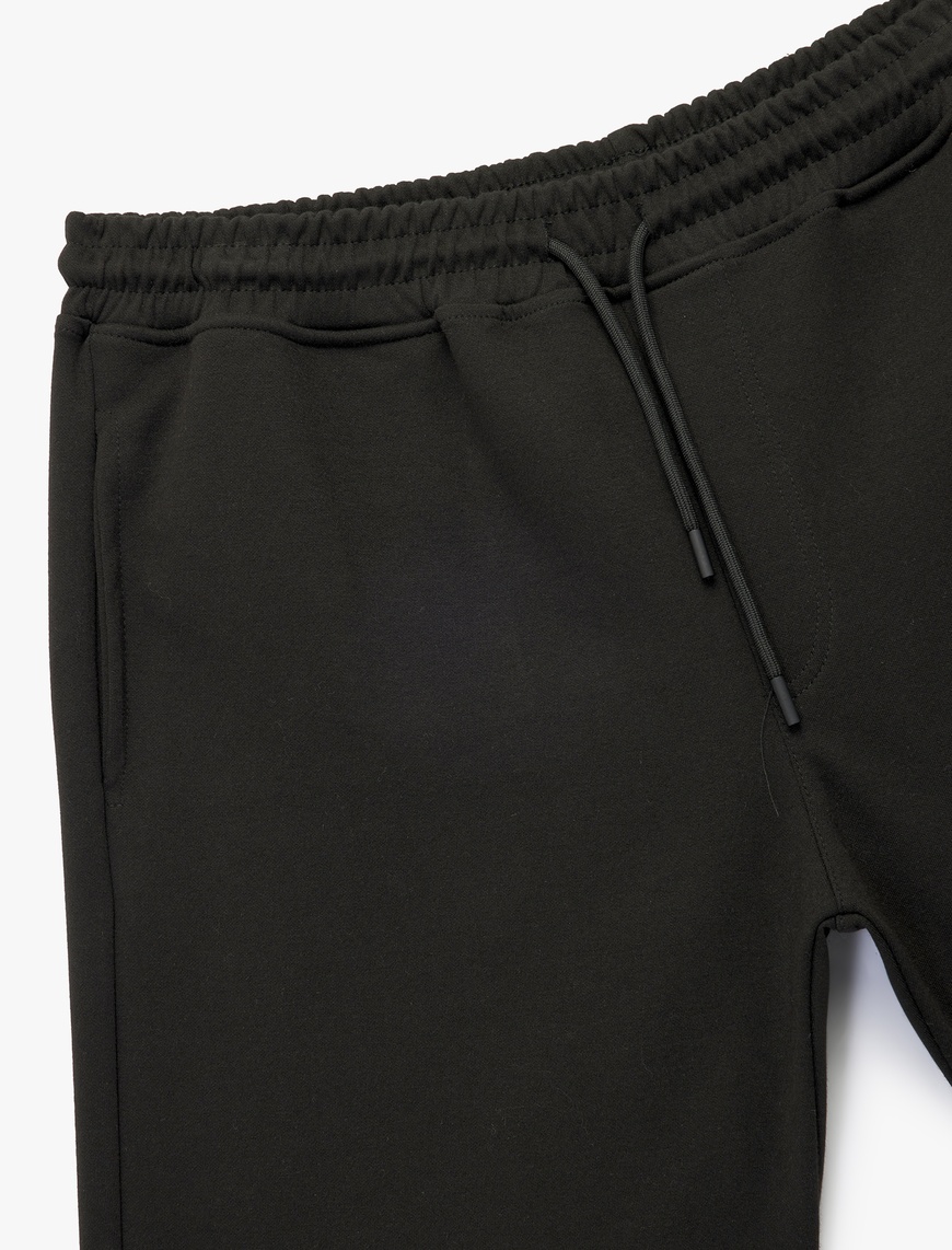   Beli Bağcıklı Cep Detaylı Kısa Spor Şort