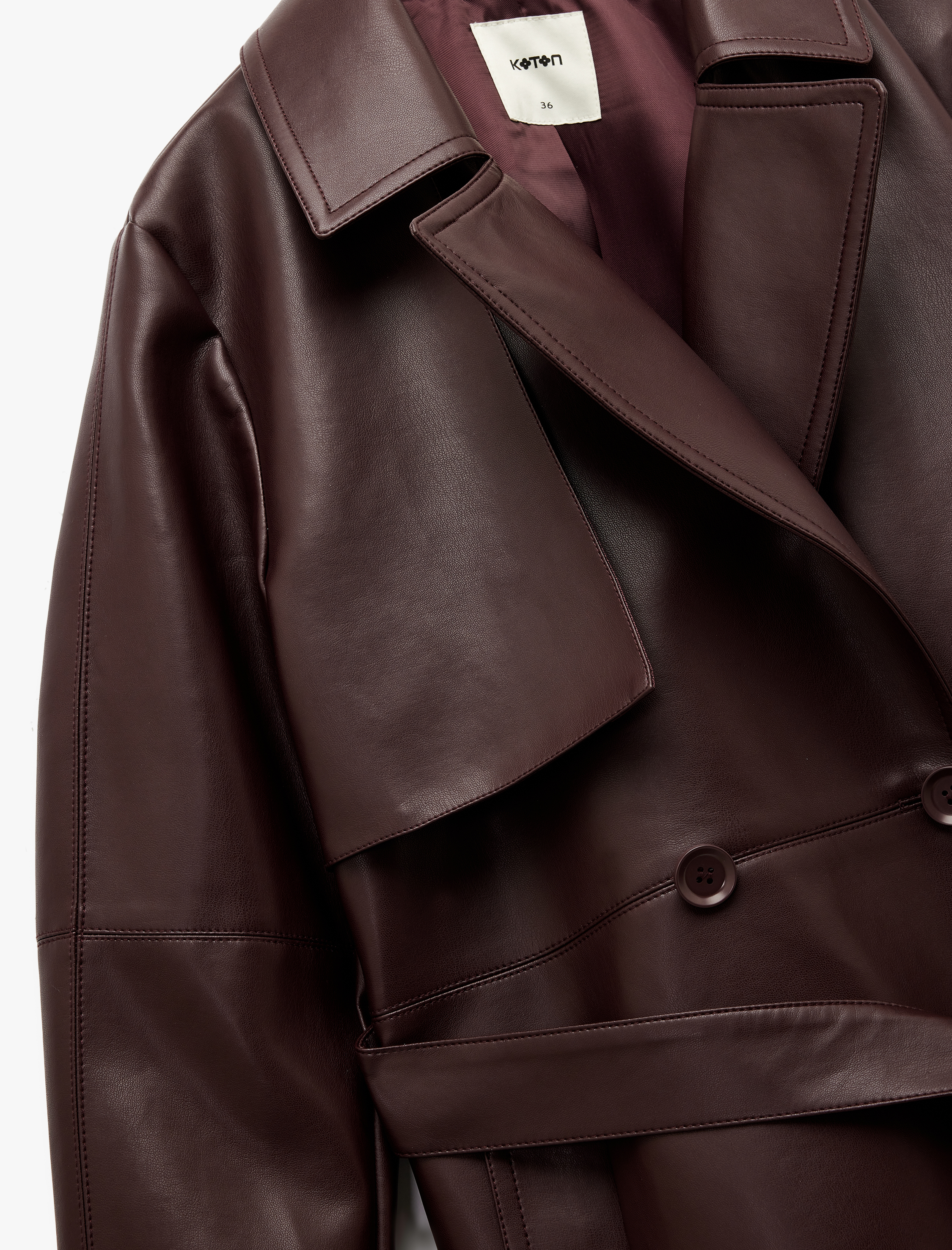   Astarlı Kemerli Rüzgar Kapak Detaylı Cepli Uzun Kollu Kruvaze Suni Deri Trençkot