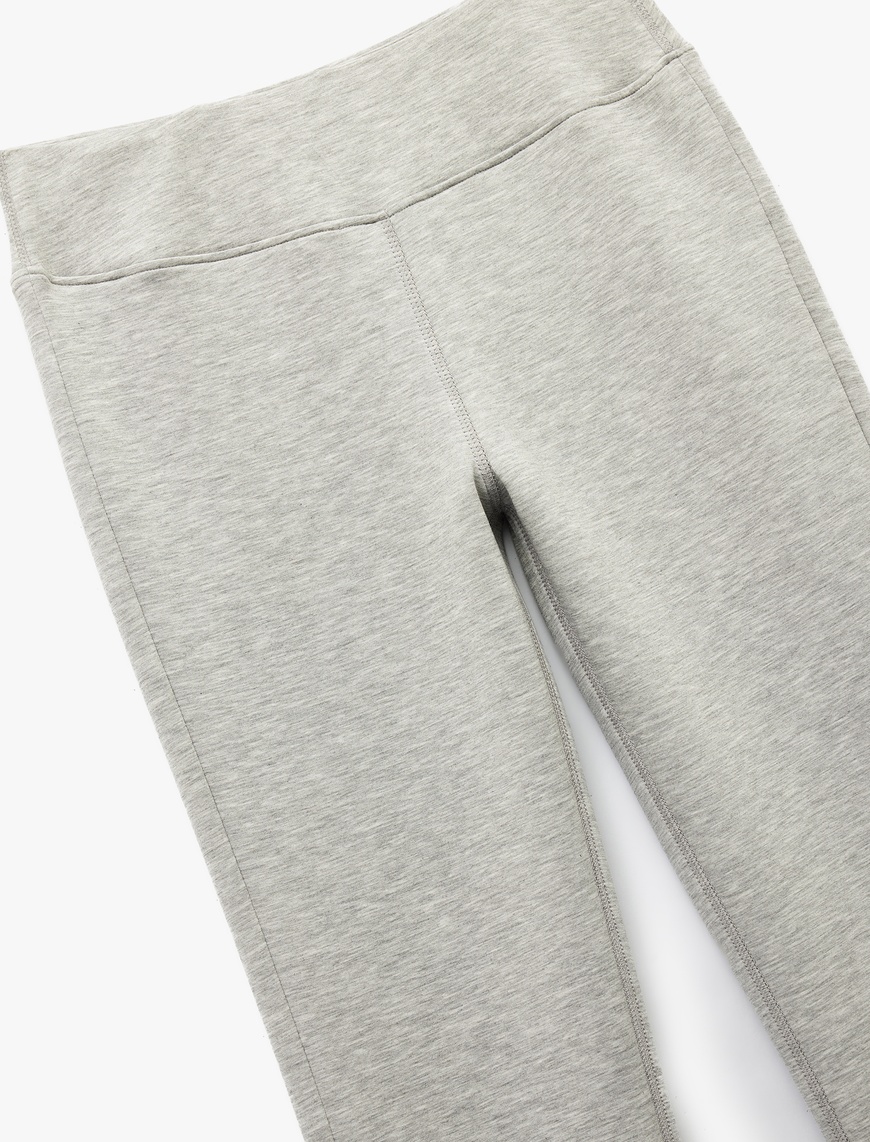   Slim Fit Paçaları Yandan Yırtmaç Detaylı İspanyol Paça Tayt