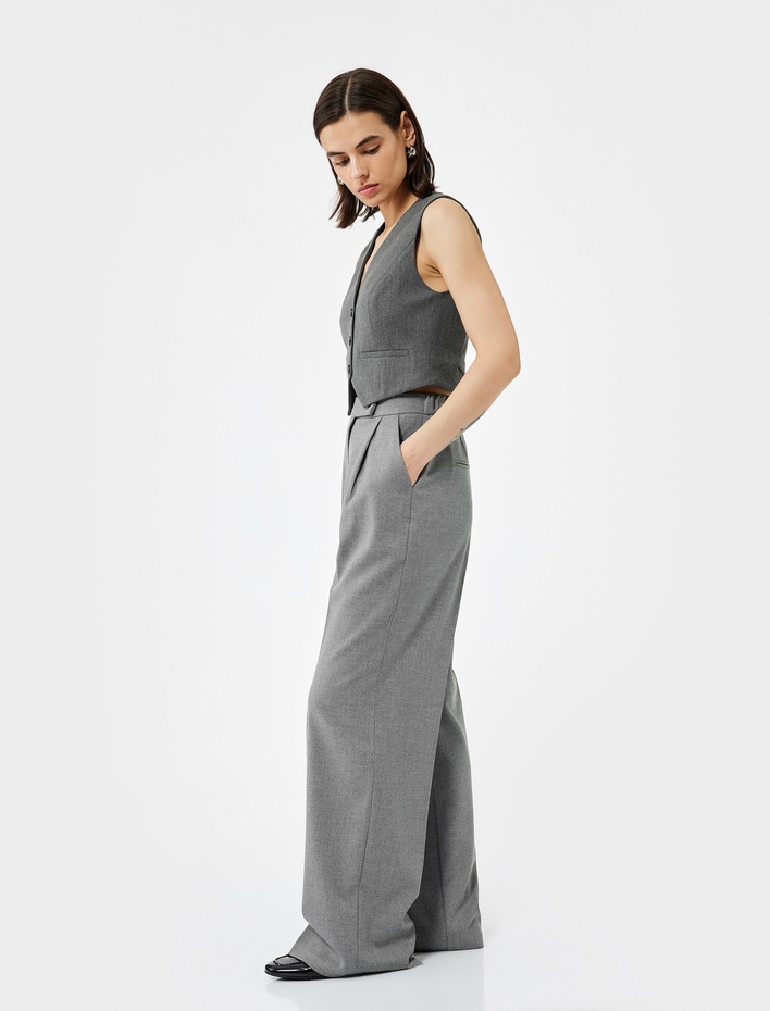  Cepli Pile Detaylı Yüksek Bel Geniş Paça Baggy Kumaş Pantolon