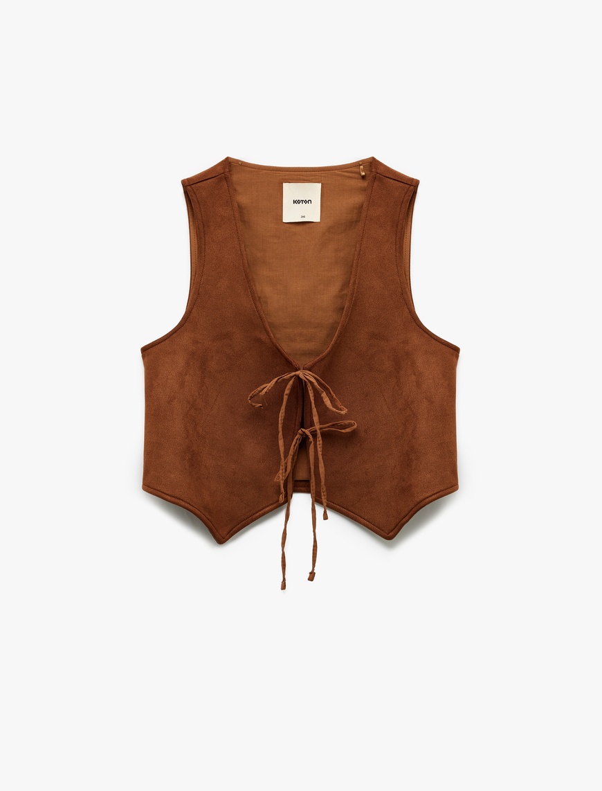   Slim Fit Önden Bağlama Detaylı Fiyonklu Suni Süet Crop Yelek