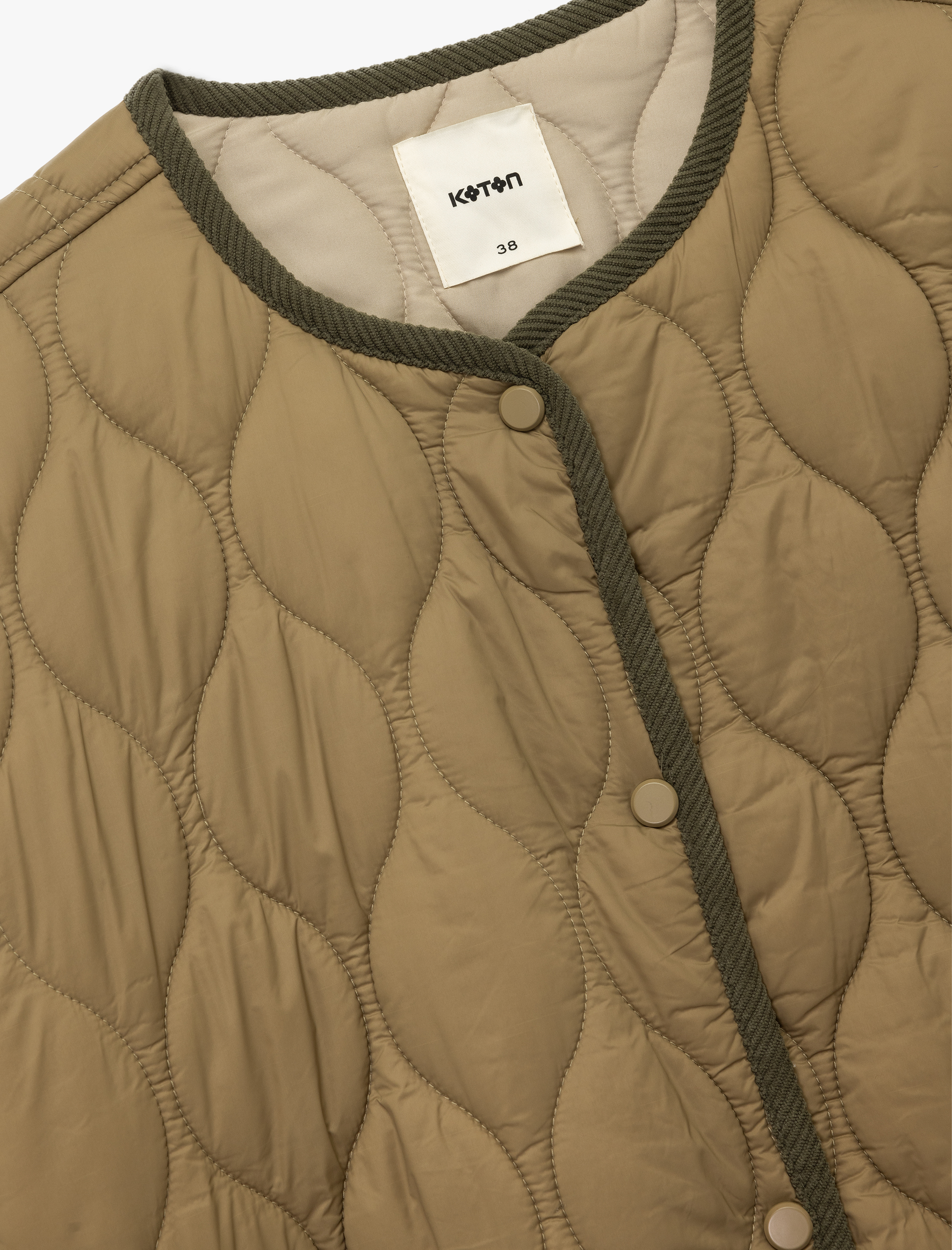   Uzun Kollu Düğmeli Cepli Bisiklet Yaka Su İtici Kapitone Mevsimlik Mont