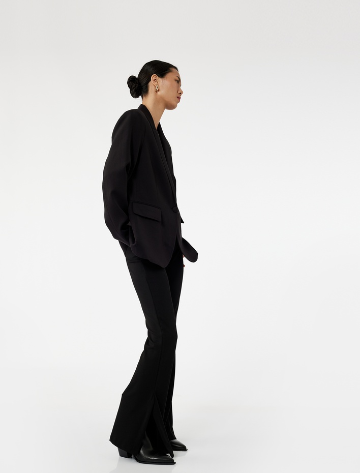  Slim Fit Yırtmaç Detaylı İspanyol Paça Pantolon