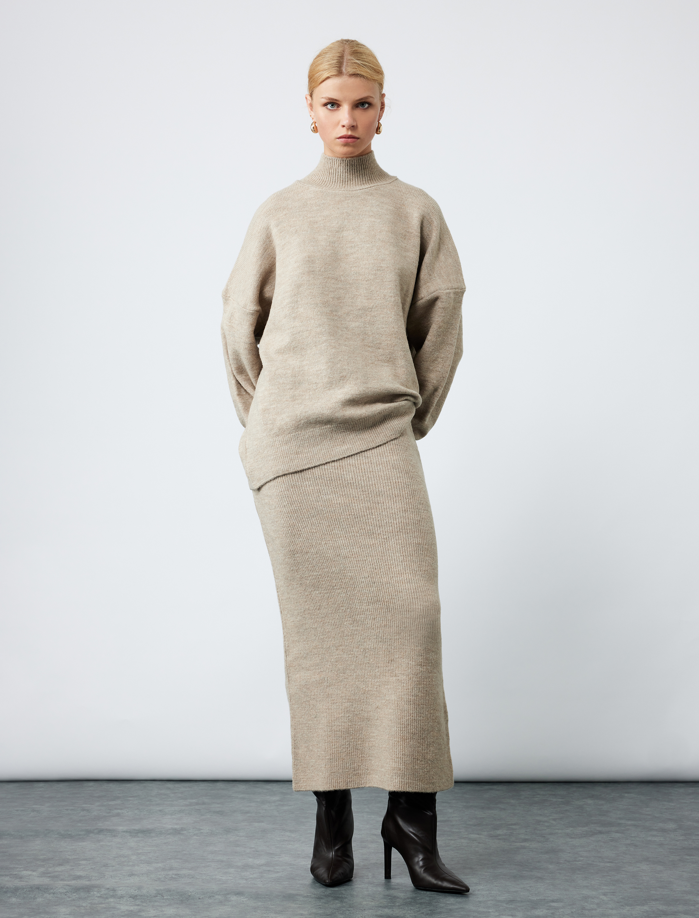   Beli Lastikli Uzun Kalem Triko Etek