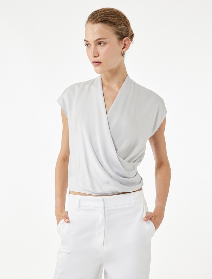  Regular Fit Dökümlü Drapeli Kolsuz Kruvaze Bluz