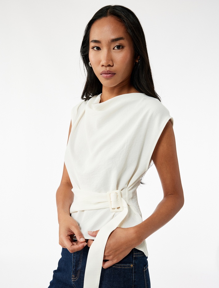  Aerobin Kumaş Kolsuz Degaje Yaka Kemer Detaylı Bluz