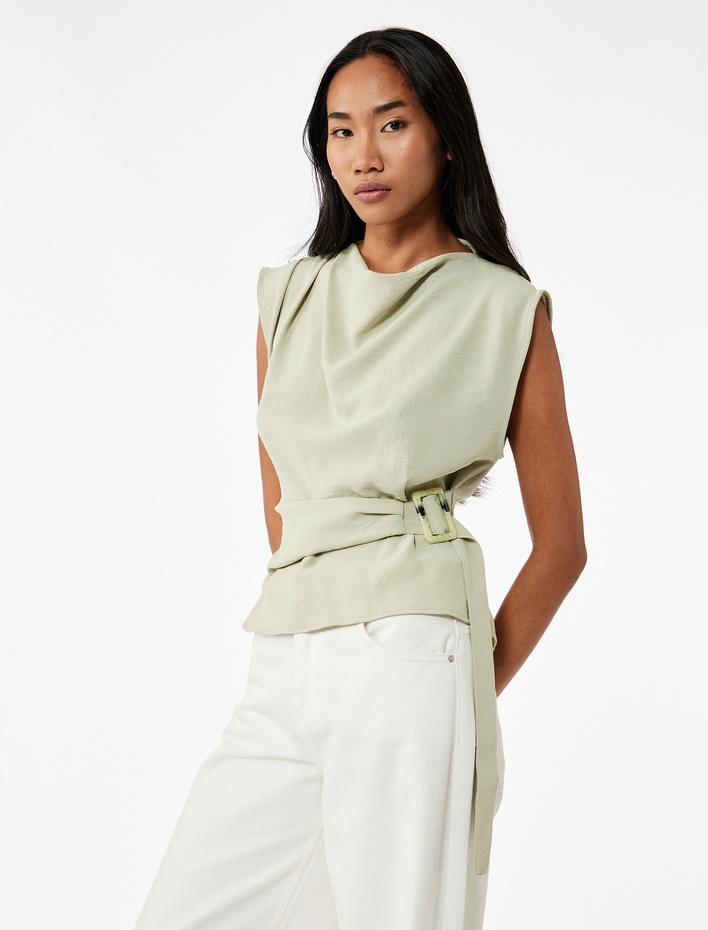  Aerobin Kumaş Kolsuz Degaje Yaka Kemer Detaylı Bluz