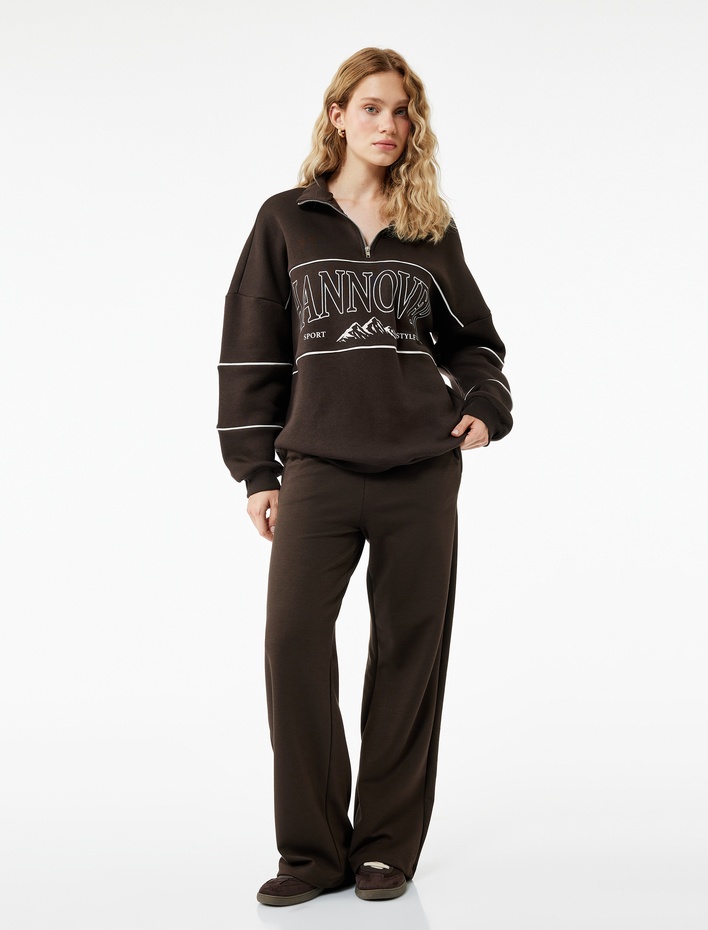  Beli Lastik Detaylı Cepli Geniş Paça Pantolon