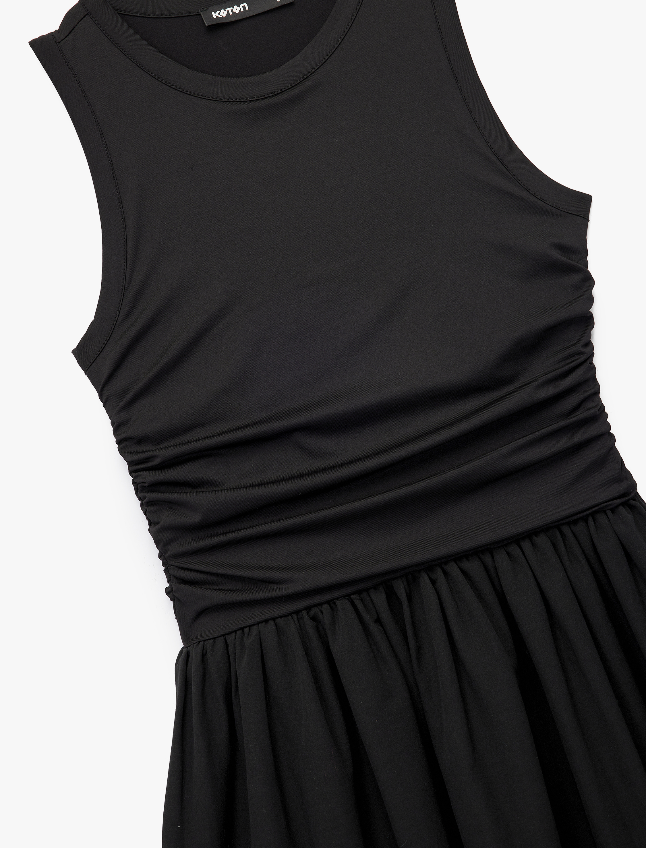   Slim Fit Bisiklet Yaka Kolsuz Midi Kloş Elbise