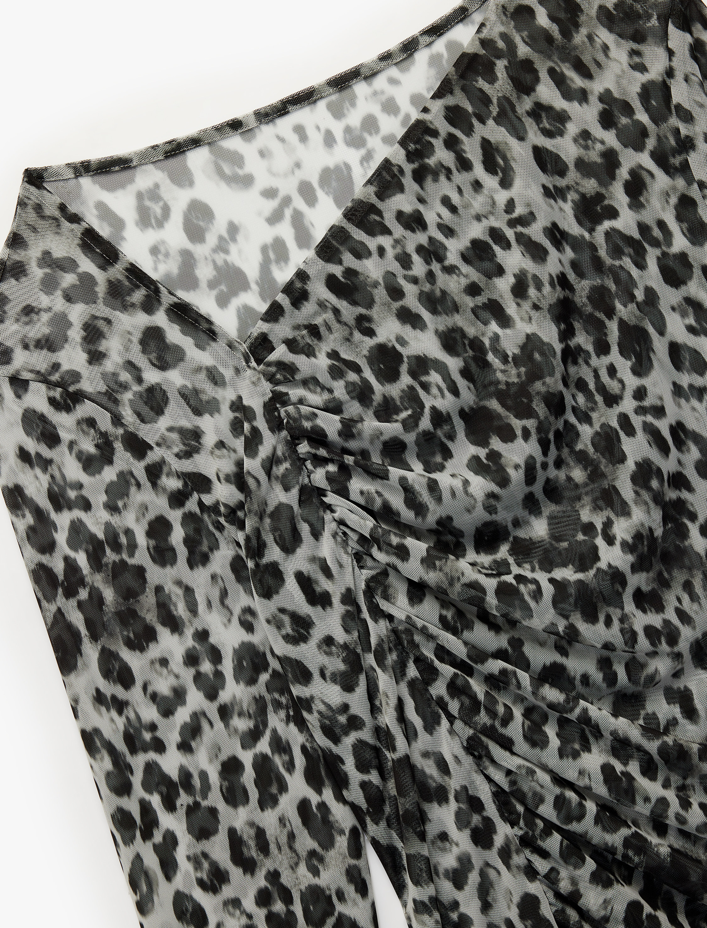   Koton X Sibil Çetinkaya - Uzun Kollu Asimetrik Yaka Geyik Desenli Transparan Tül Bluz