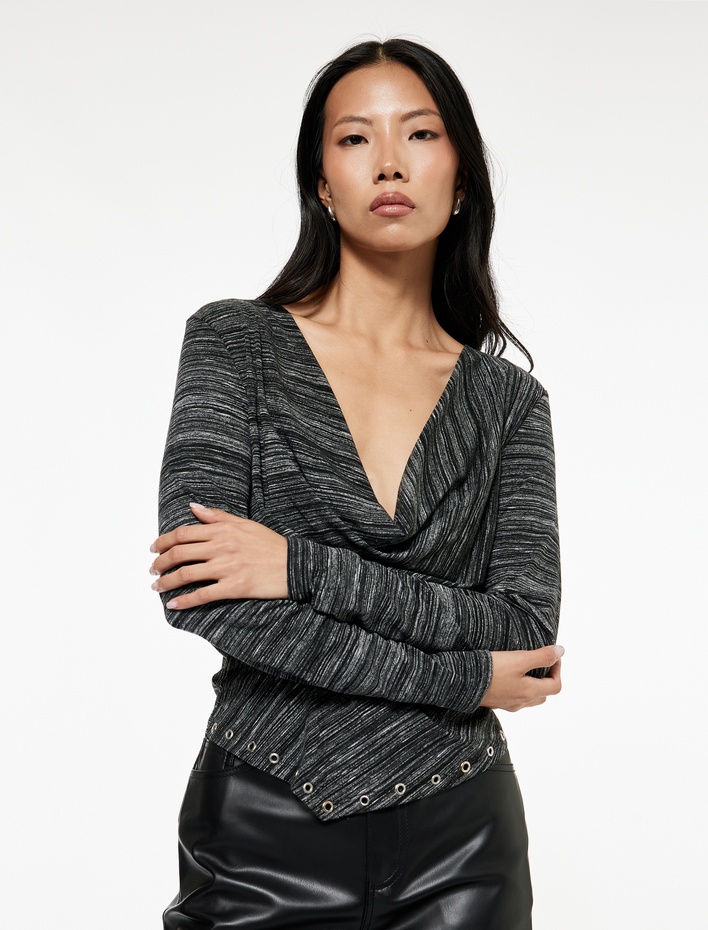  Koton X Sibil Çetinkaya - Uzun Kollu Kuş Gözü Detaylı Asimetrik Degaje Yaka Bluz