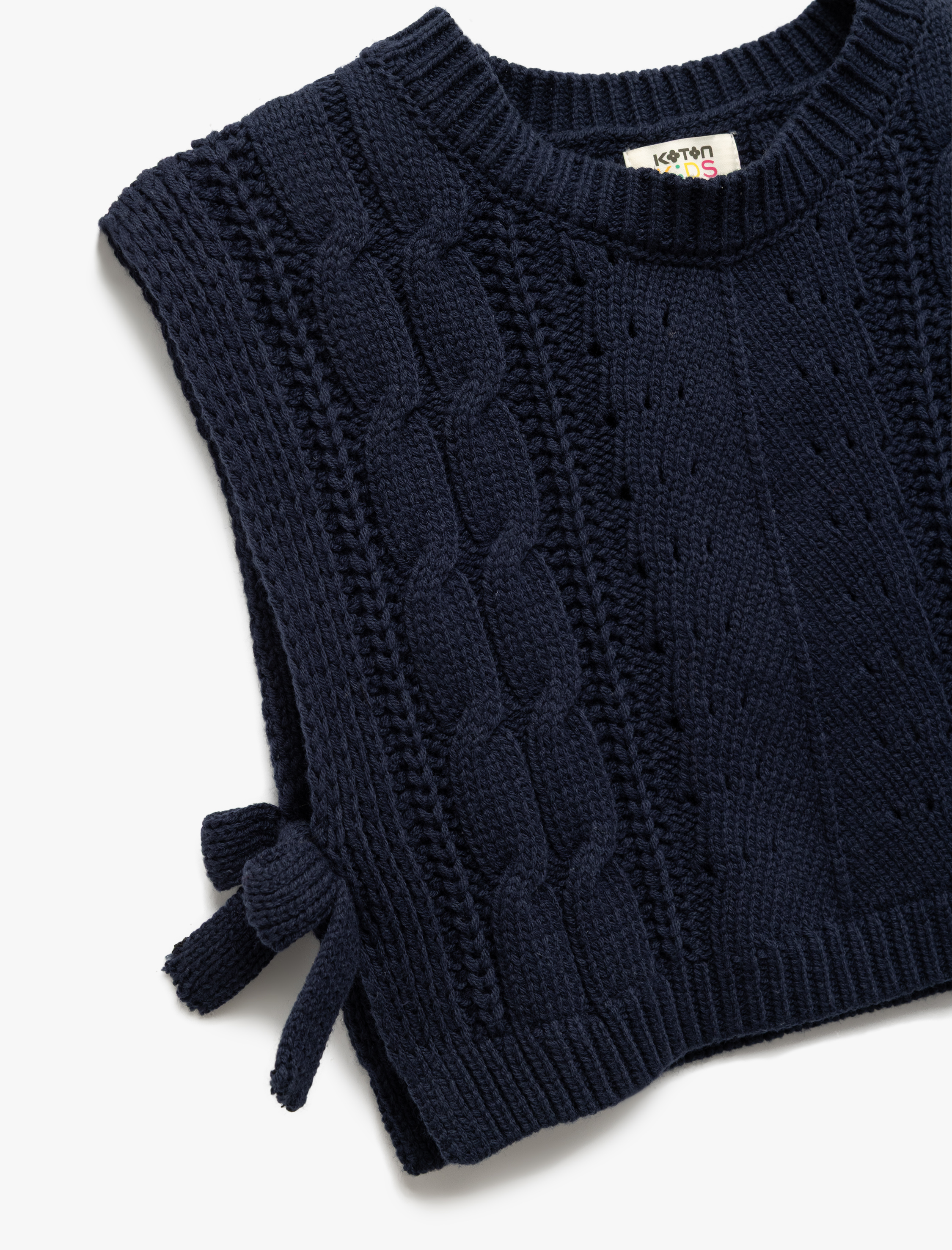  Kız Çocuk Bisiklet Yaka Kolsuz Saç Örgü Dokulu Fiyonklu Crop Süveter