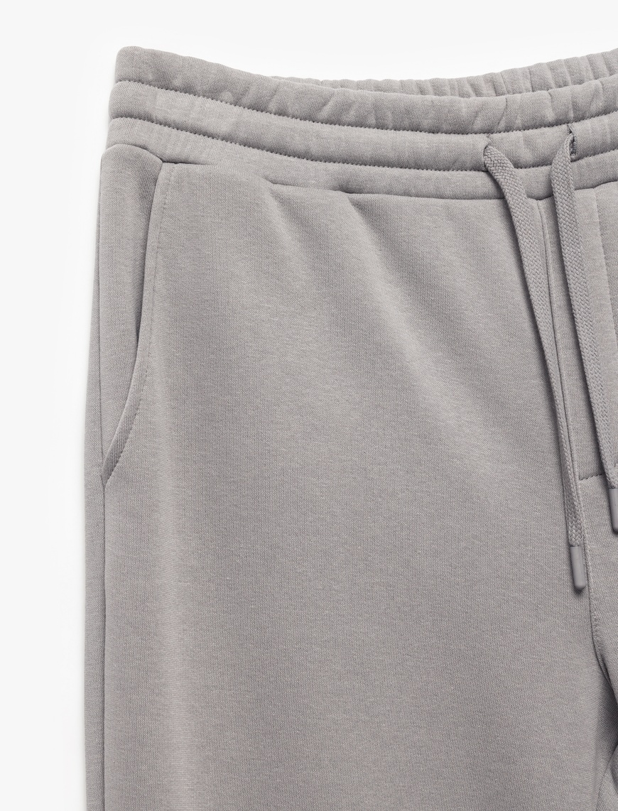   Beli Bağcıklı Şardonlu Cep Detaylı Jogger Eşofman Altı