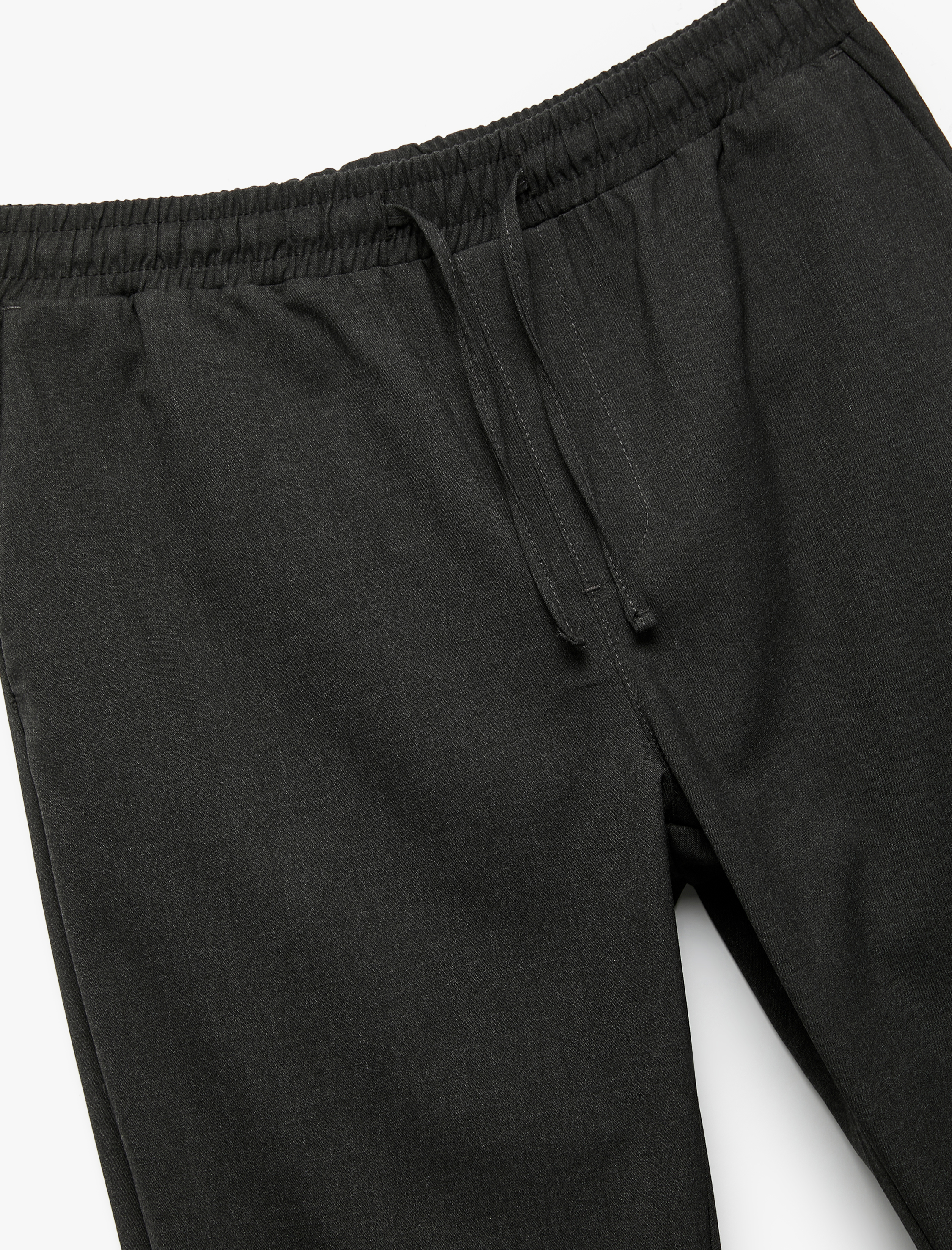   Beli Bağcıklı Katlamalı Paça Rahat Kesim Cep Detaylı Slim Fit Pantolon