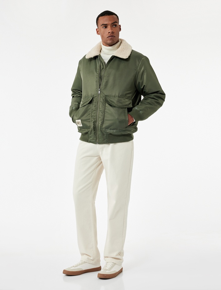  Uzun Kollu Cepli Etiket Detaylı Peluş Yaka Mont