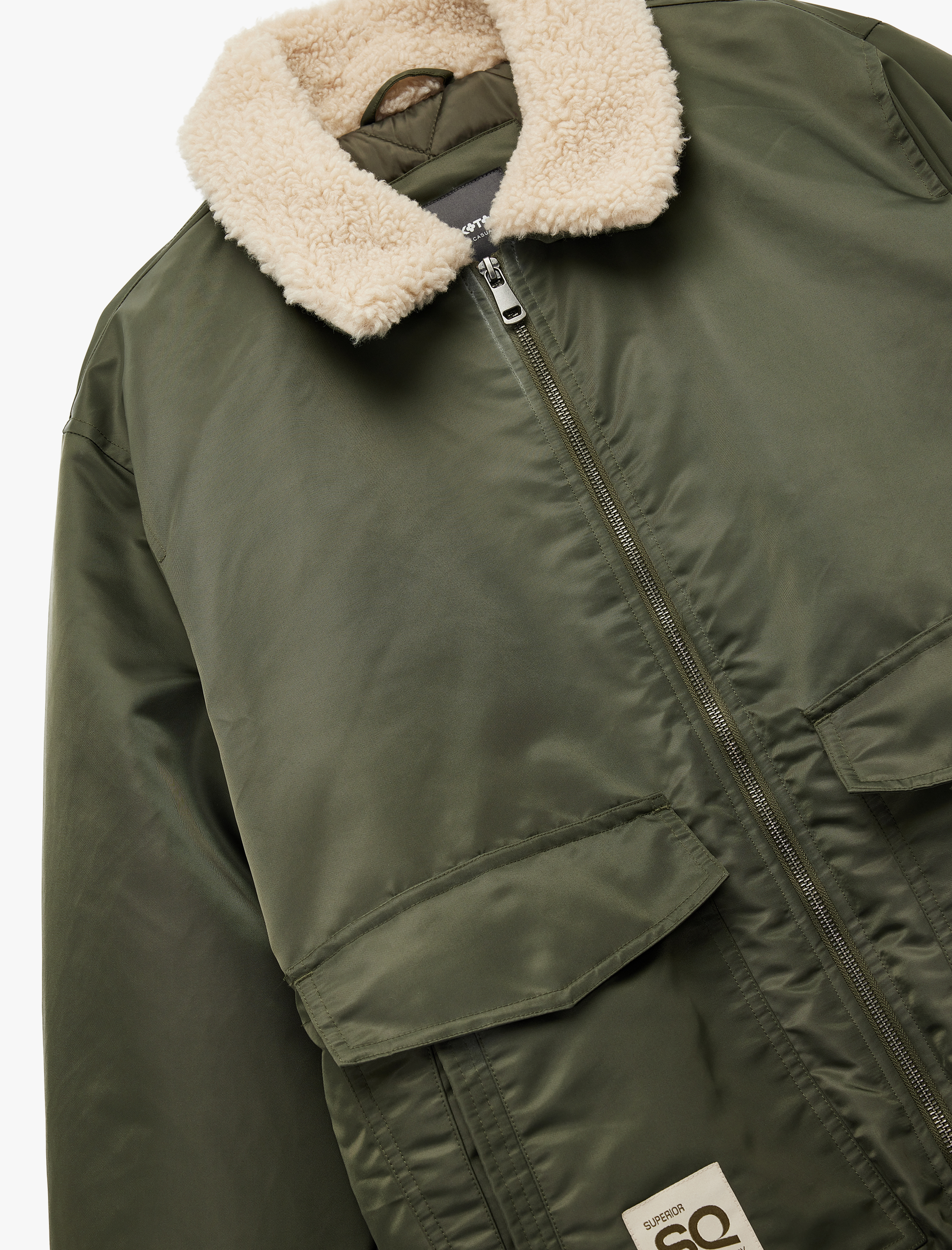 Uzun Kollu Cepli Etiket Detaylı Peluş Yaka Kışlık Mont