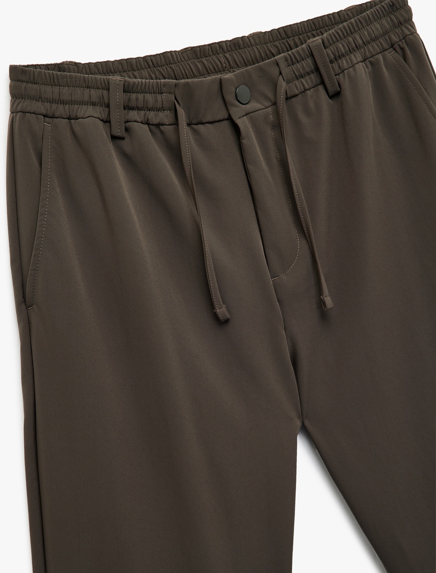   Beli Bağcıklı Düğmeli Duble Paça Ütü Gerektirmeyen Esnek Slim Fit Pantolon