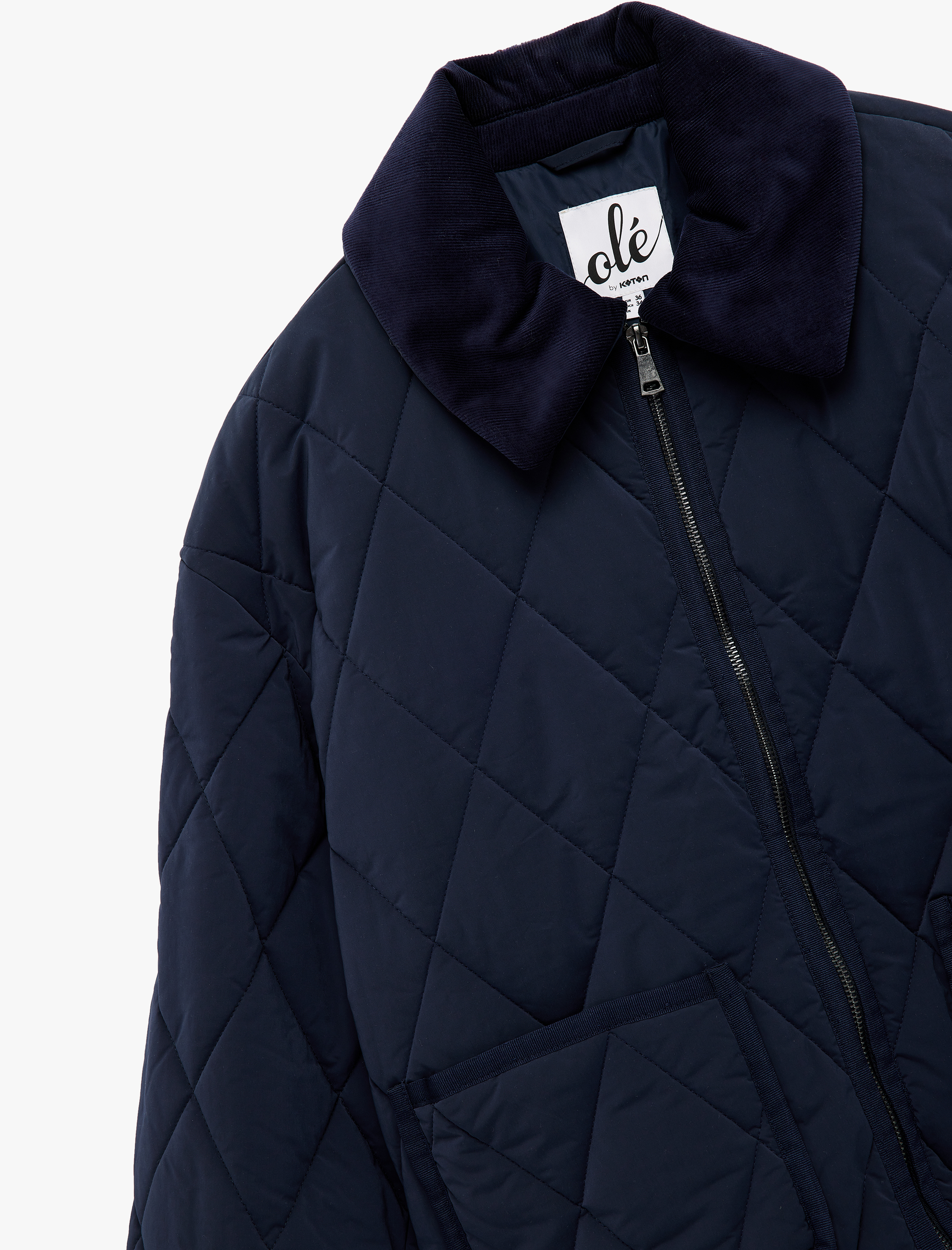   Uzun Kollu Fermuarlı Cep Detaylı Klasik Yaka Kapitone Ceket