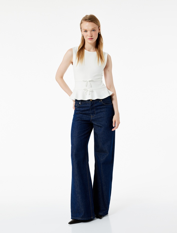  Slim Fit Bisiklet Yaka Volanlı Fiyonklu Kolsuz Bluz