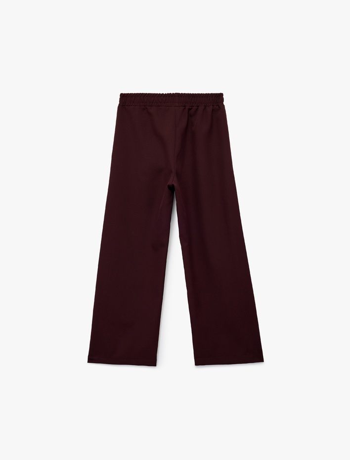 Kız Çocuk Geniş Paça Biyeli Cepli Bol Kalıp Beli Lastikli Pantolon