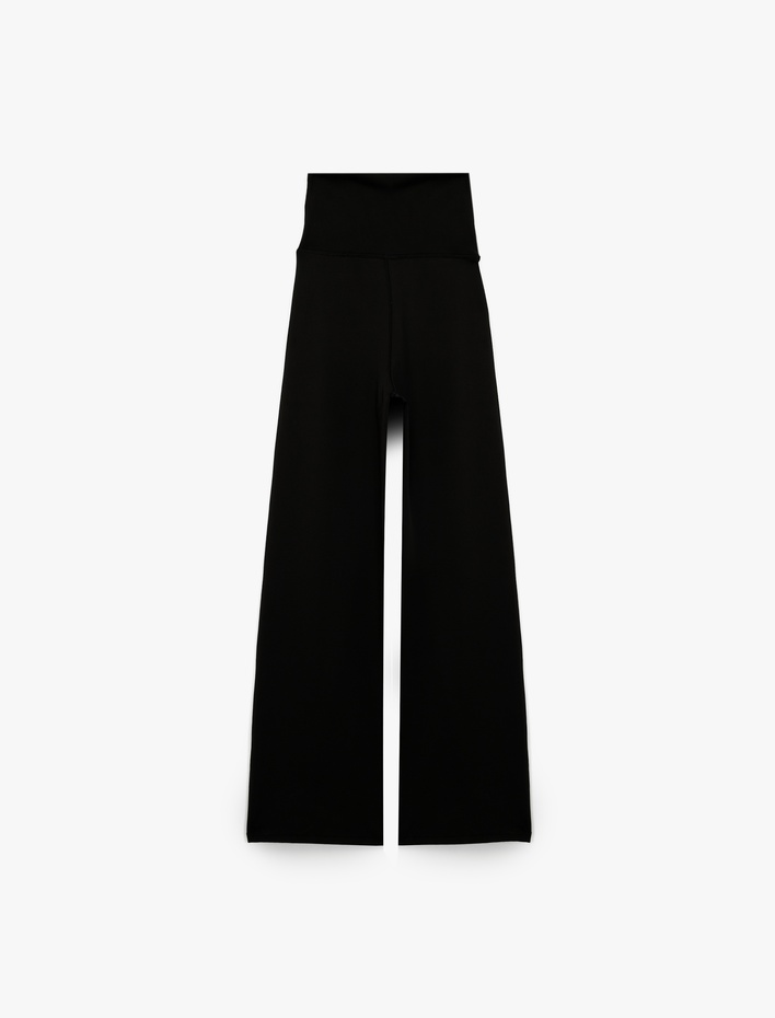  Koton X Sibil Çetinkaya - Katlı Yüksek Bel Dikiş Detaylı İspanyol Paça Spor Tayt