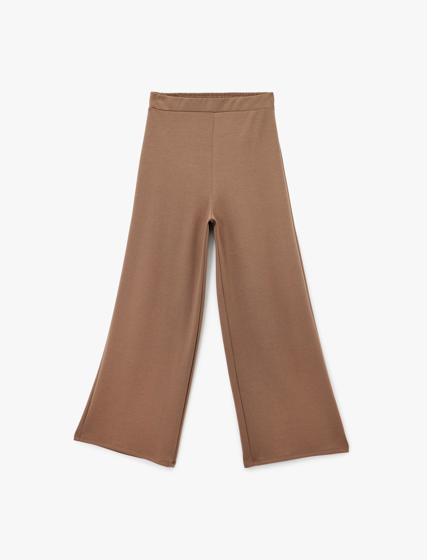   Beli Lastikli Düz Bol Paça Eşofman Pantolon