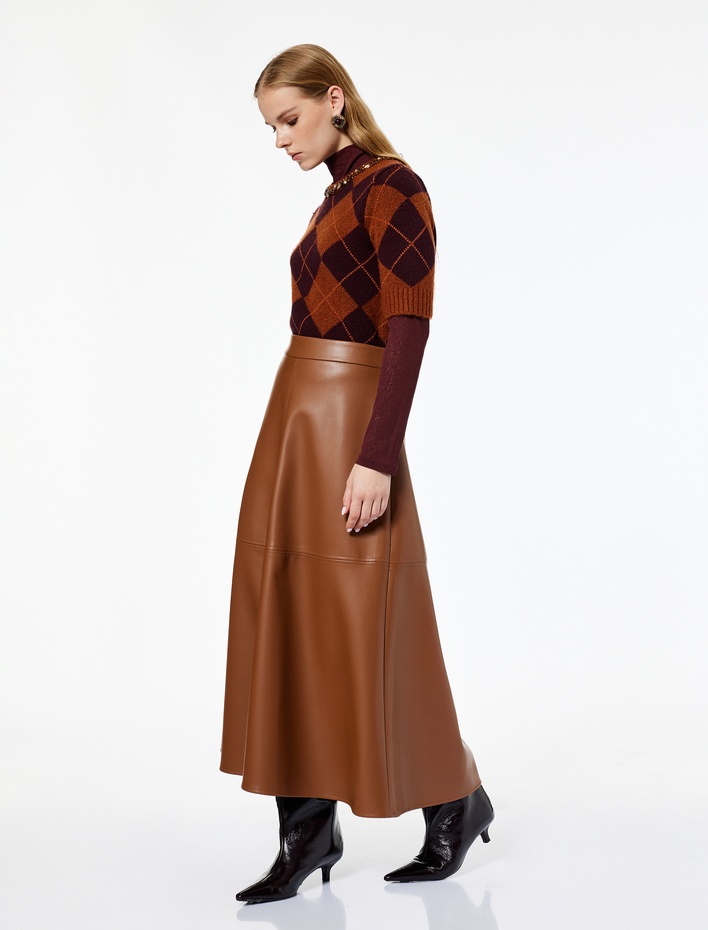  Koton X Melis Ağazat - Volanlı Kloş Kesim Midi Suni Deri Etek