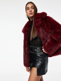 Metal Aksesuarlı Yırtmaçlı Düşük Bel Slim Fit Mini Suni Deri Etek