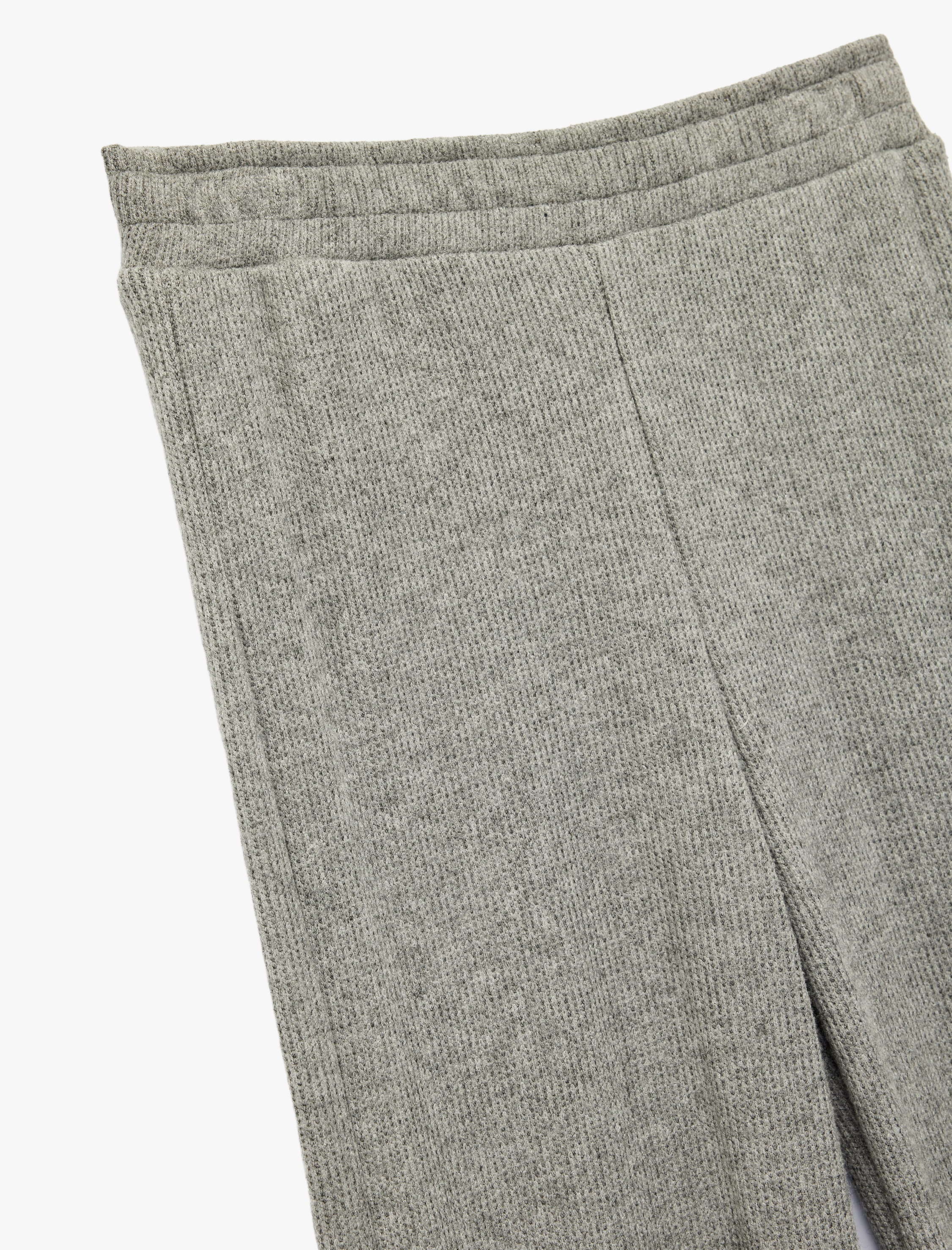   Beli Lastikli Düz Bol Paça Dokulu Pantolon