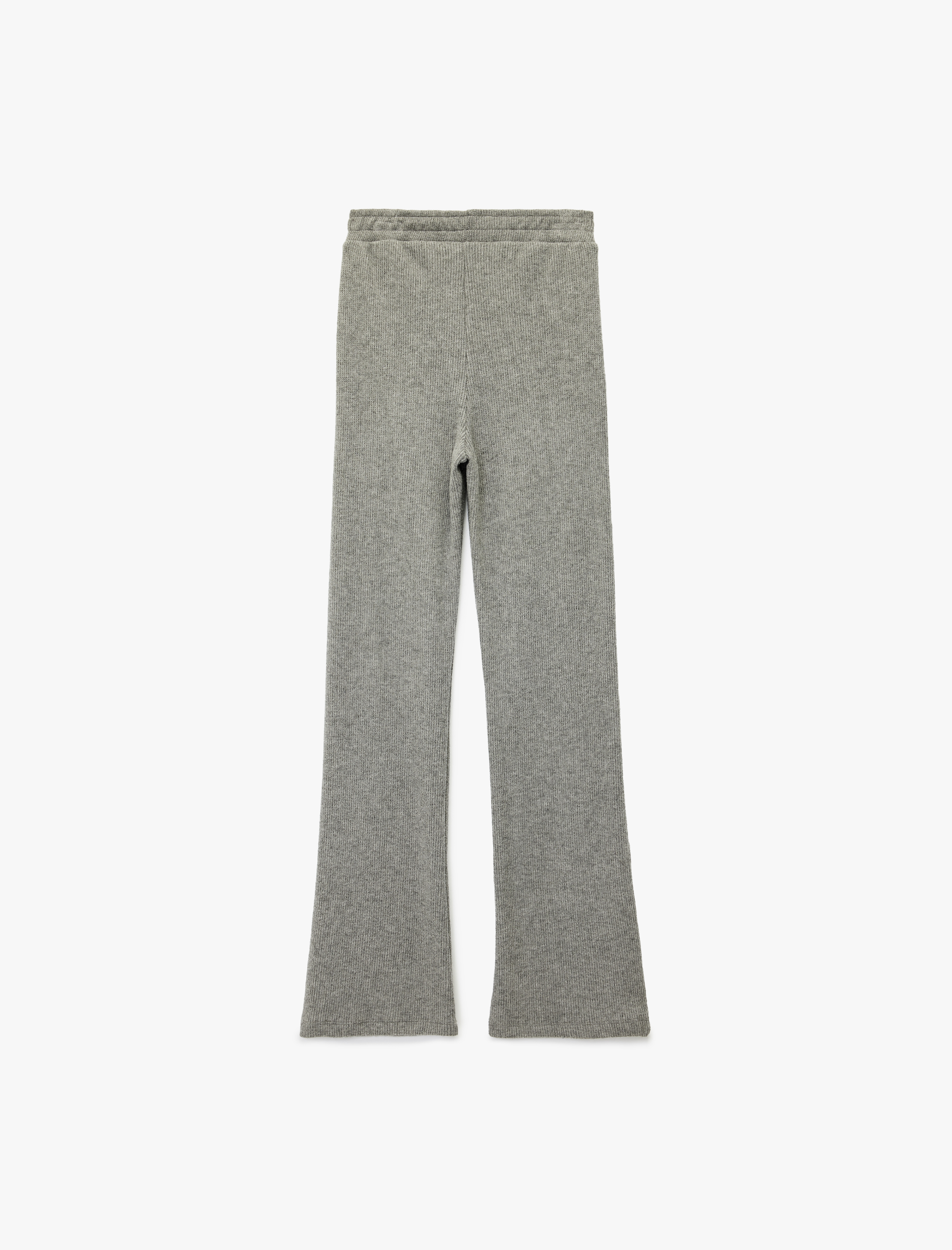   Beli Lastikli Düz Bol Paça Dokulu Pantolon