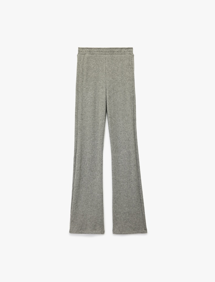  Beli Lastikli Düz Bol Paça Dokulu Pantolon