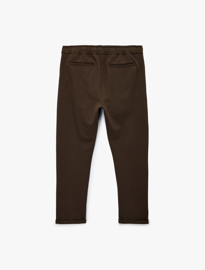  Cep Detaylı Katlamalı Paça Rahat Kesim Beli Bağcıklı Pantolon