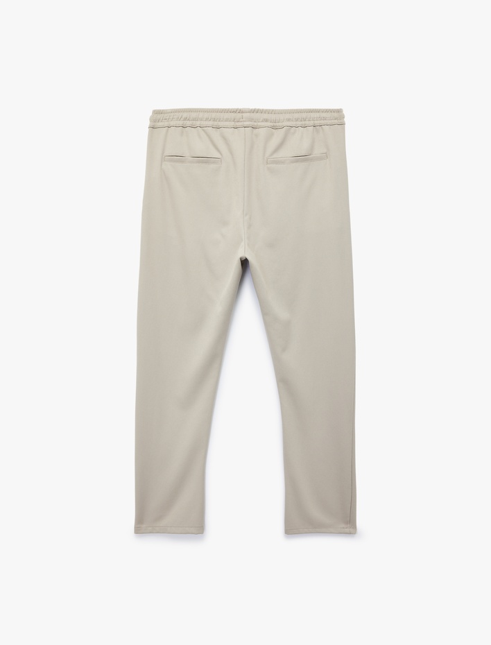  Viskon Karışımlı Cep Detaylı Rahat Kesim Beli Bağcıklı Pantolon