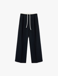 Cepli Pile Detaylı Beli Bağcıklı Geniş Paça Kumaş Pantolon