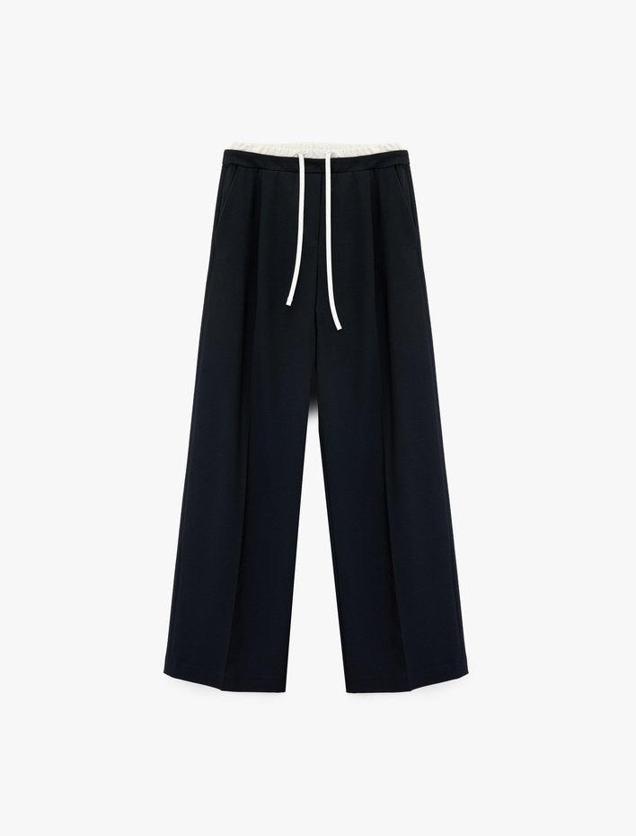  Cepli Pile Detaylı Beli Bağcıklı Geniş Paça Kumaş Pantolon