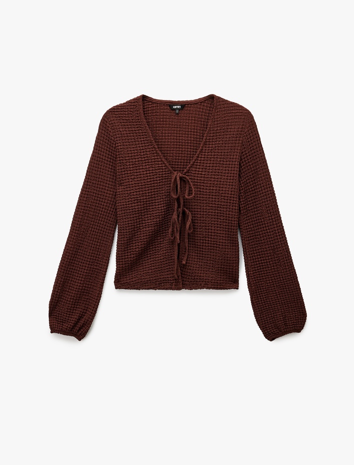  Slim Fit Uzun Kollu V Yaka Fiyonk Bağlama Detaylı Dokulu Bluz