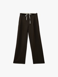 Cepli Pile Detaylı Beli Bağcıklı Geniş Paça Kumaş Pantolon