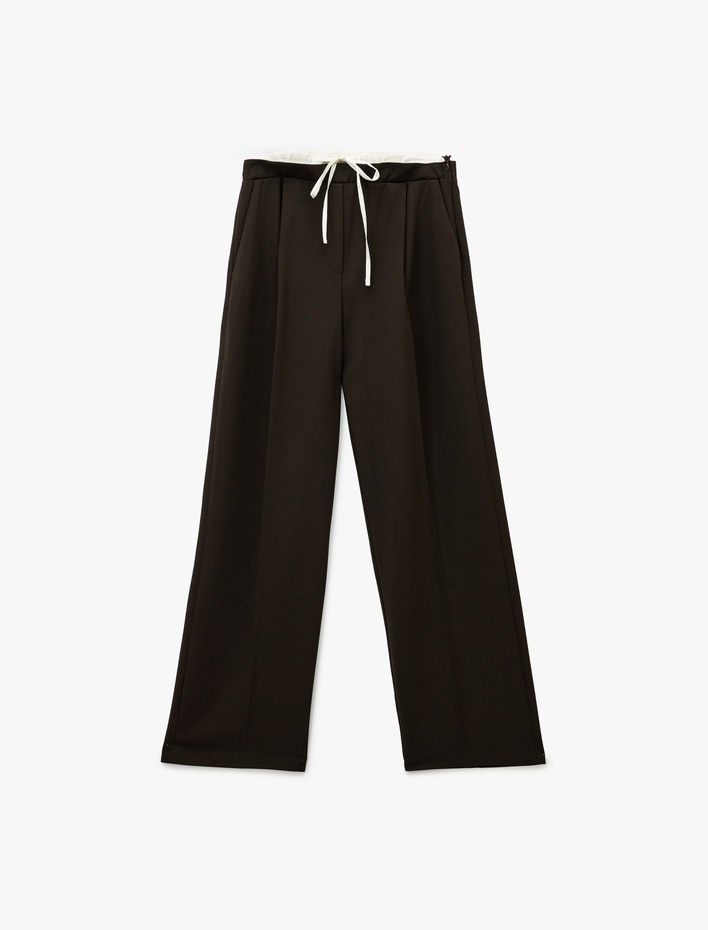  Cepli Pile Detaylı Beli Bağcıklı Geniş Paça Kumaş Pantolon