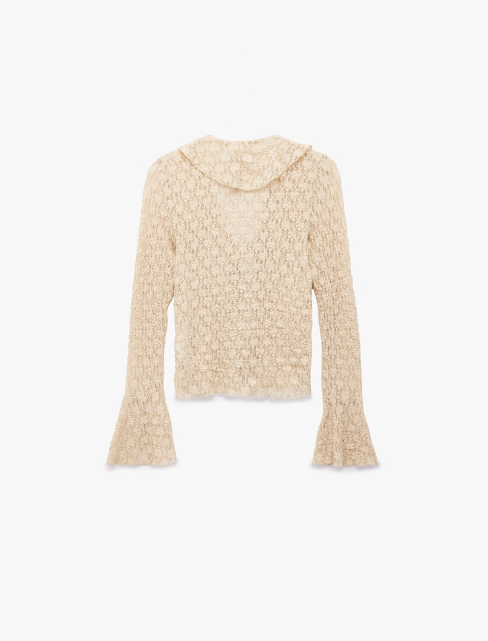  Koton X Sibil Çetinkaya - Uzun İspanyol Kollu V Yaka Bağlamalı Fırfırlı Dantelli Bluz