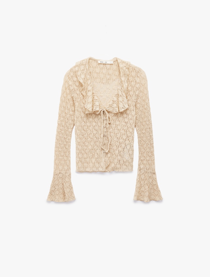  Koton X Sibil Çetinkaya - Uzun İspanyol Kollu V Yaka Bağlamalı Fırfırlı Dantelli Bluz