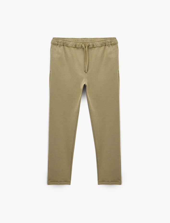  Cep Detaylı Katlamalı Paça Rahat Kesim Beli Bağcıklı Pantolon