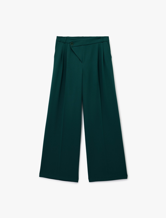  Asimetrik Kapama Detaylı Cepli Pile Detaylı Geniş Paça Kumaş Pantolon