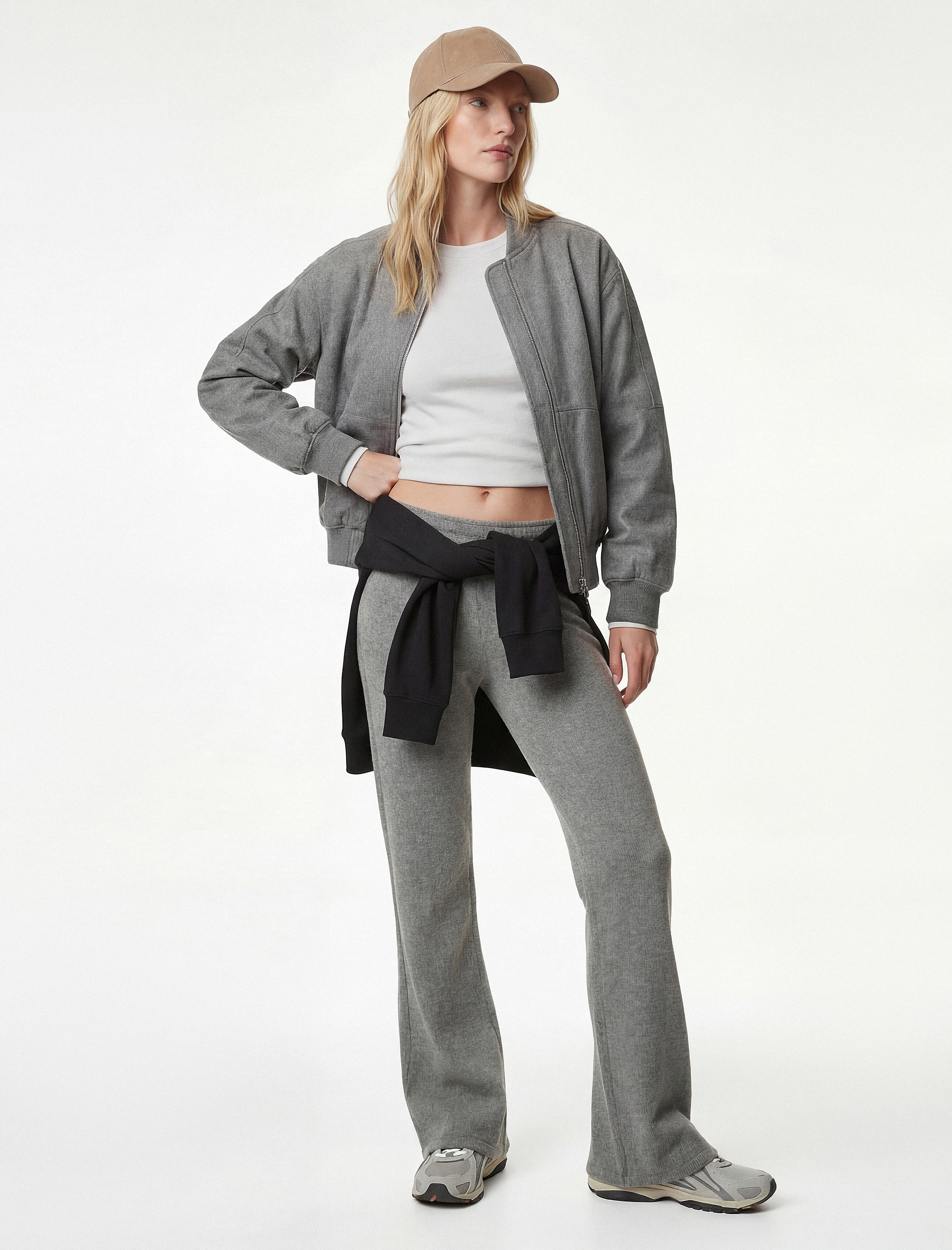   Beli Lastikli Düz Bol Paça Dokulu Pantolon