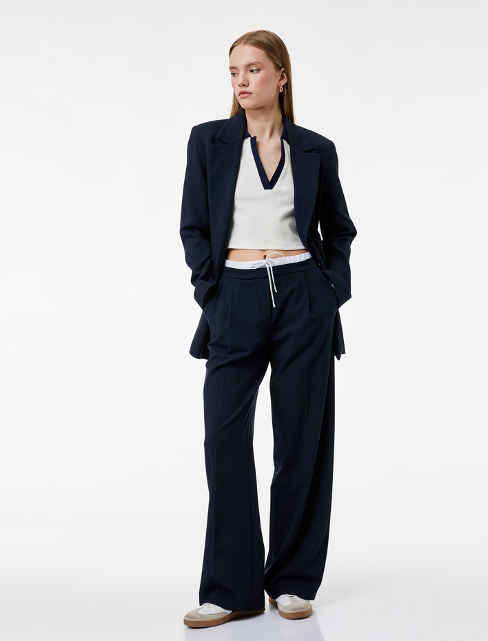  Cepli Pile Detaylı Beli Bağcıklı Geniş Paça Kumaş Pantolon